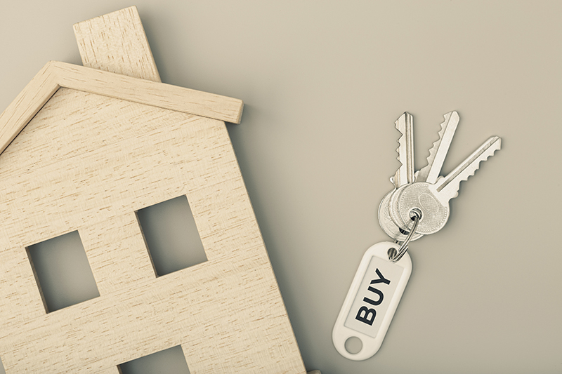 Buying a house concept. Real estate market. House icon with keys - JN Bank