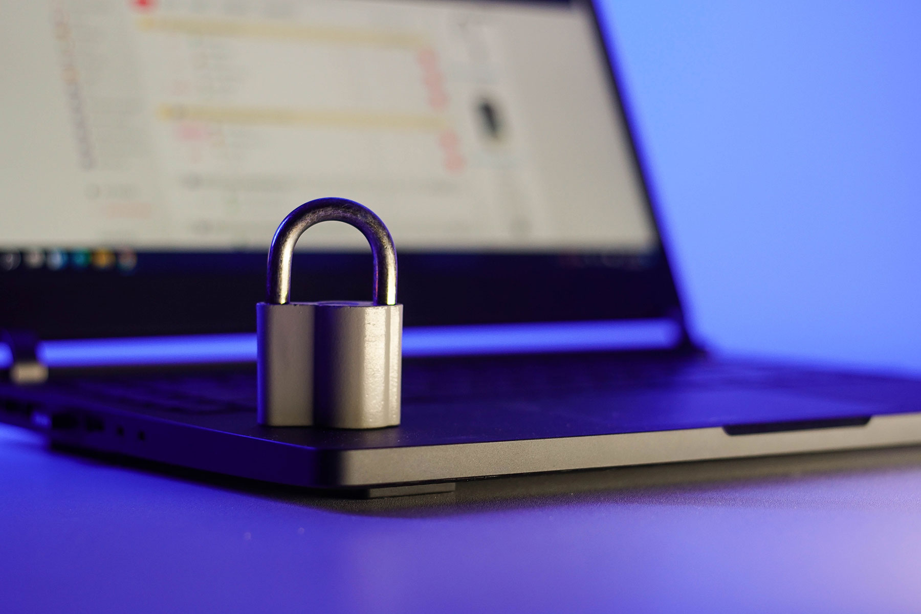 locked-metal-padlock-on-a-laptop-keyboard-over-blu-2022-10-18-16-56-16-utc - JN Bank