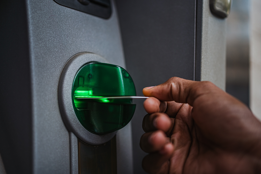 man-inserting-a-credit-card-in-an-atm-2023-02-02-04-47-24-utc - JN Bank