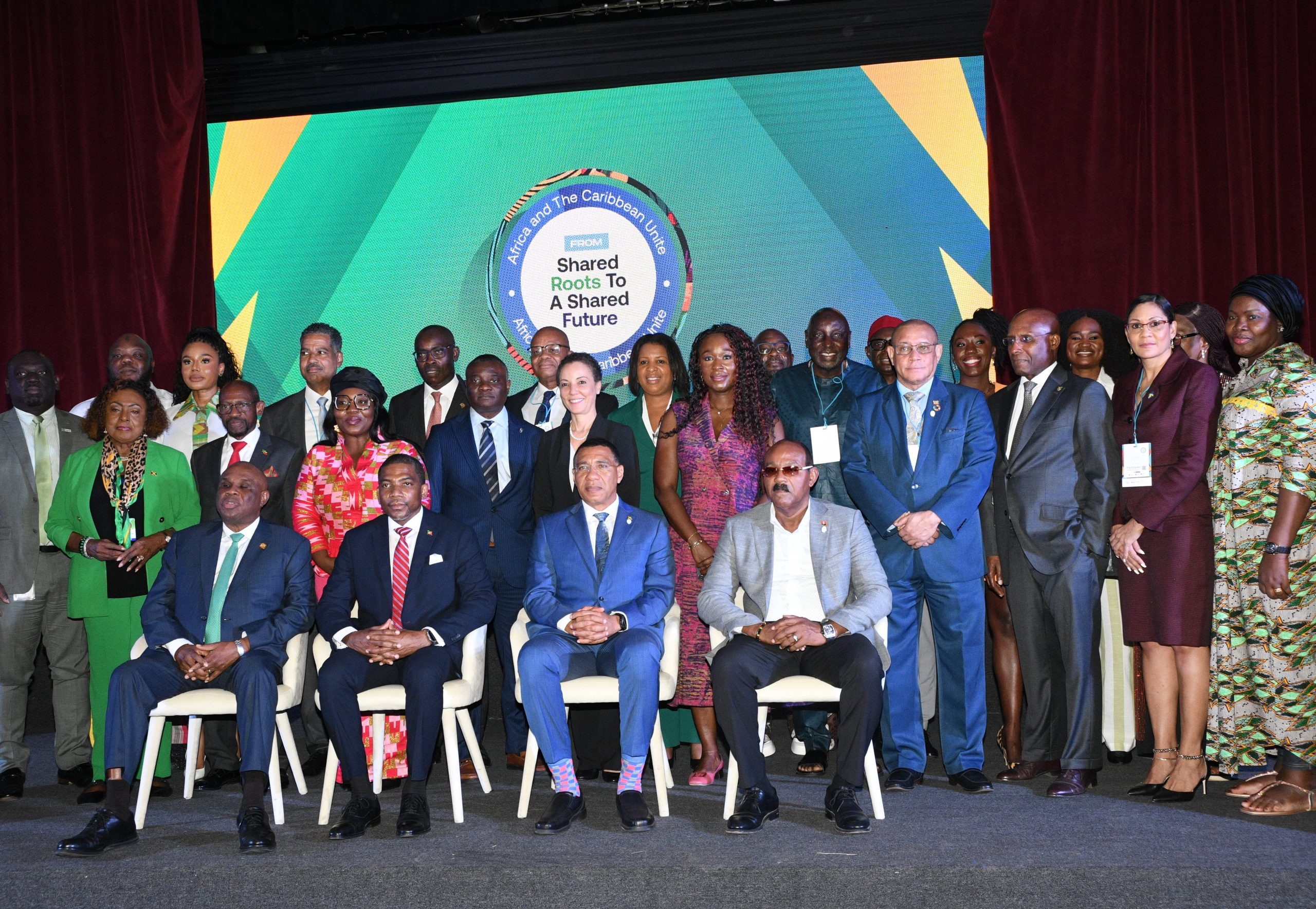 DSC_4969 - JN Bank Dr. Andrew Holness (seated second from right), Prime Minister of Jamaica and chair of CARICOM, is pictured alongside fellow CARICOM Heads of Government, including Gaston Browne (seated far right), Prime Minister of Antigua and Barbuda, and Dr. Terrance Drew (seated second from left), Prime Minister of St. Kitts and Nevis. They were joined by an African delegation led by Professor Benedict Okechukwu Oramah (seated far left), president and chairman of the Board of the African Export-Import Bank (Afreximbank), along with representatives from JN Bank and other Jamaican Government officials. The occasion was an official side meeting to the 49th CARICOM Heads of Government Meeting, held in Montego Bay, Jamaica on July 8, focused on strengthening partnerships between Africa and the Caribbean.